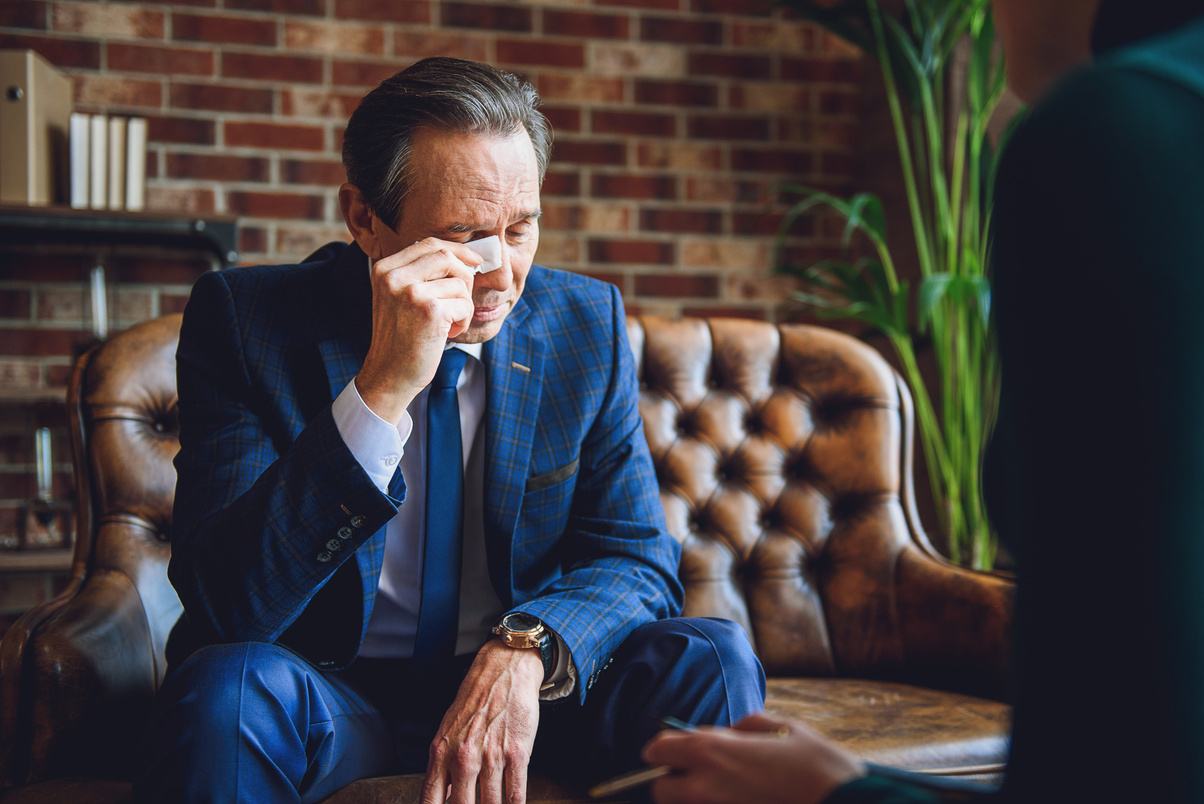 Deep emotions of middle aged businessman