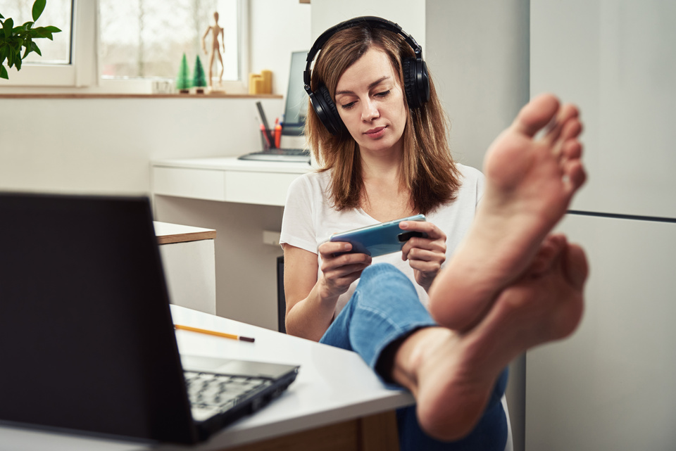 Woman Playing Games during Work Hours 