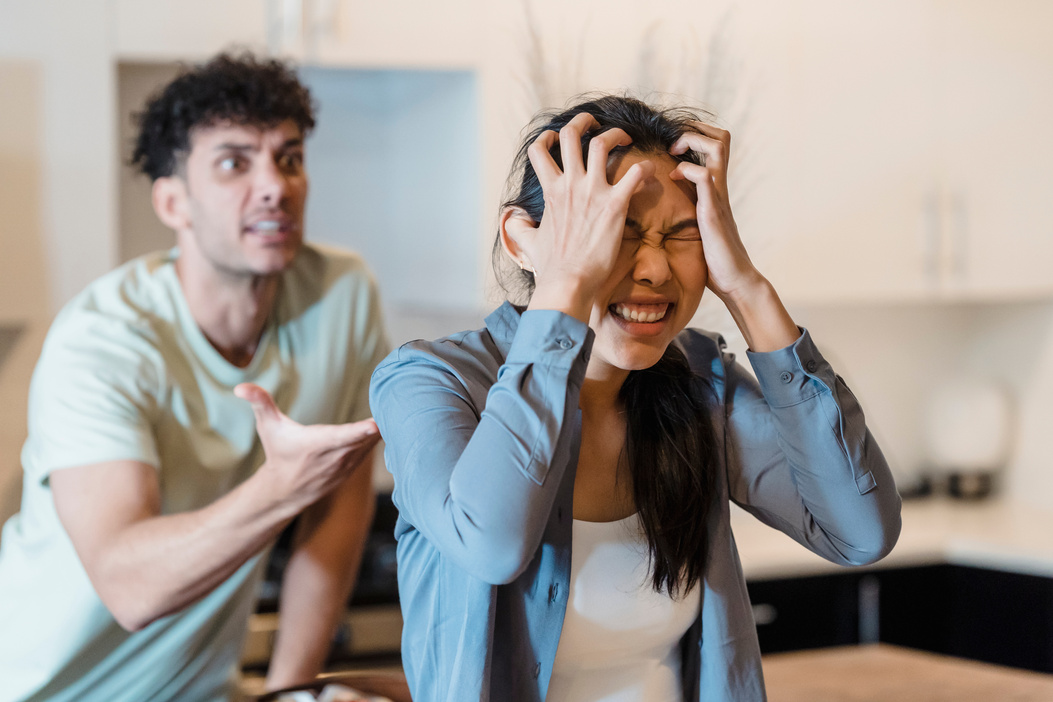 Stressed Woman Holding Her Head